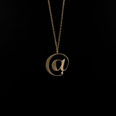 Gold @ necklace by Moshik Nadav Typography